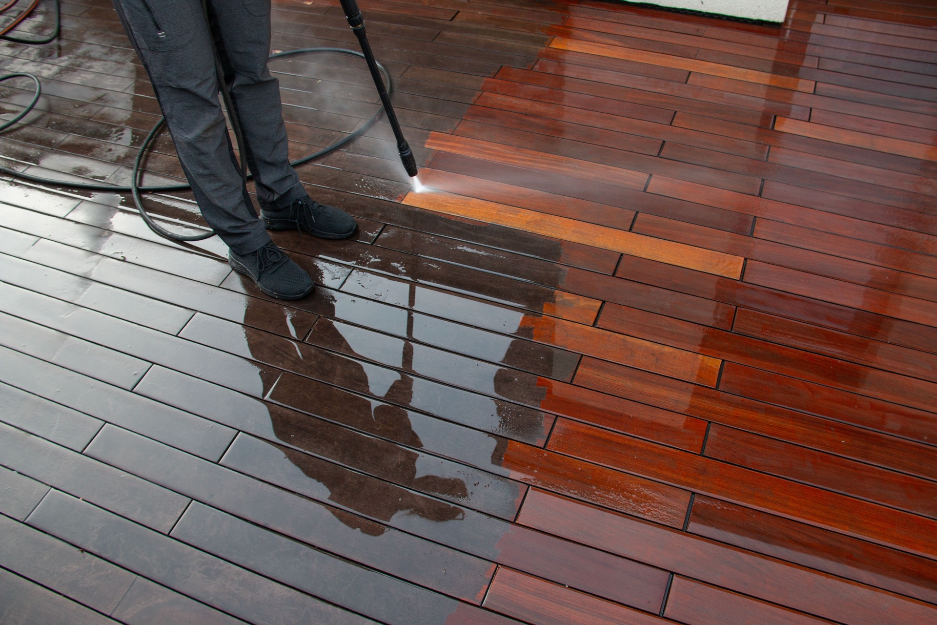 Cleaning terrace with a power washer